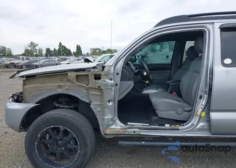 2014 Toyota Tacoma Base V6 z USA, uszkodzony, nr VIN 3TMMU4FN6EM064709